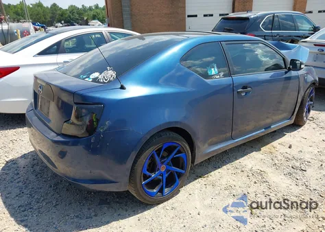 2011 Scion Tc z USA, uszkodzony, nr VIN JTKJF5C76B3005402
